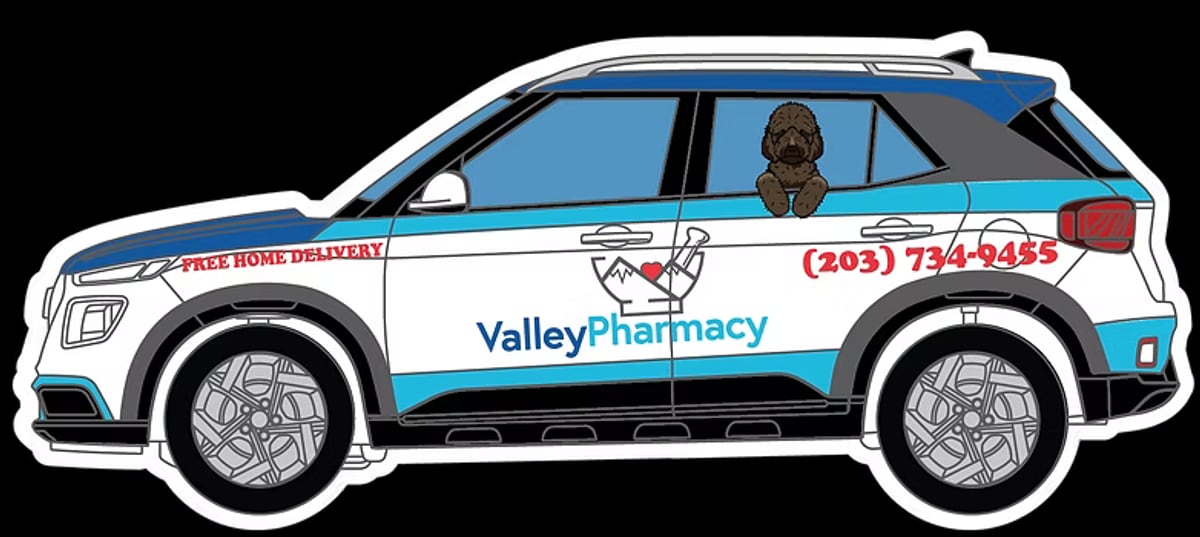 Valley Pharmacy branded delivery vehicle offering free home delivery